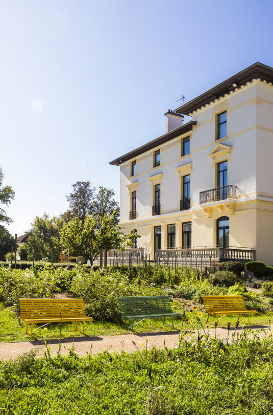 Fermob Louisiane 150cm outdoor steel folding bench in Ireland color, suitable for garden or patio seating.