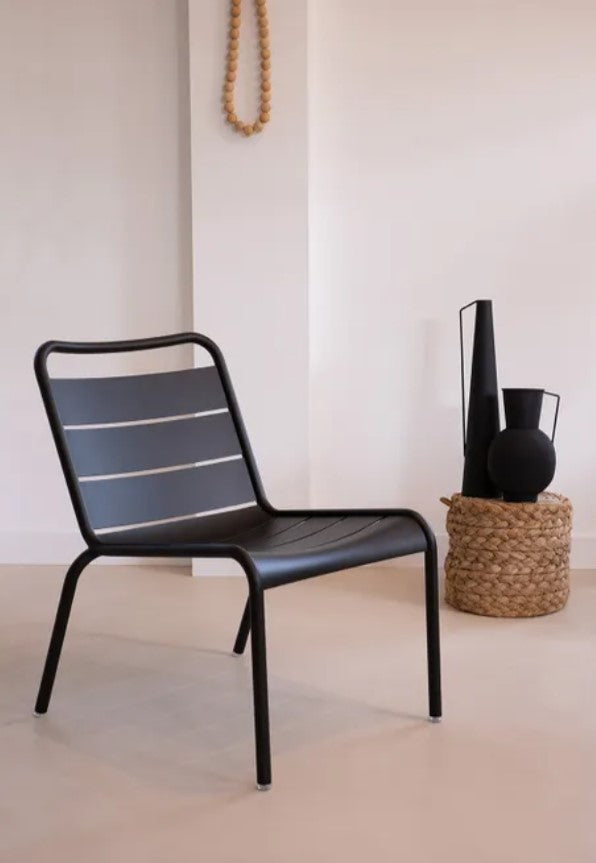 Load image into Gallery viewer, Fermob Luxembourg Lounge Chair with armrests, stylish outdoor furniture for hotel, restaurant, or cafe settings.
