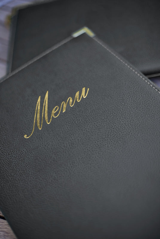 Securit Menu Set - Classic A45 Black - 10 Menu Holders + 20 Extra Pouches - in use
