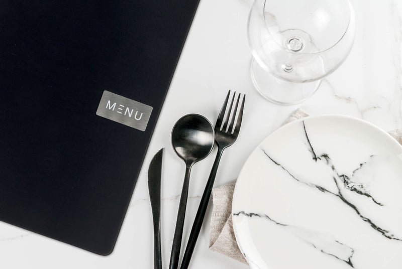 Load image into Gallery viewer, Securit Menu Set - Leather Royal A4 Black - 10 Menu Holders + 20 Extra Pouches - in use
