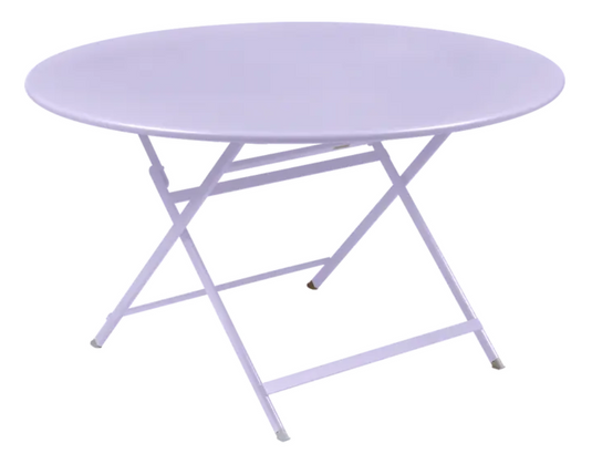 Fermob Caractère foldable metal table with 128 cm diameter, suitable for eight people, in a marshmallow color.