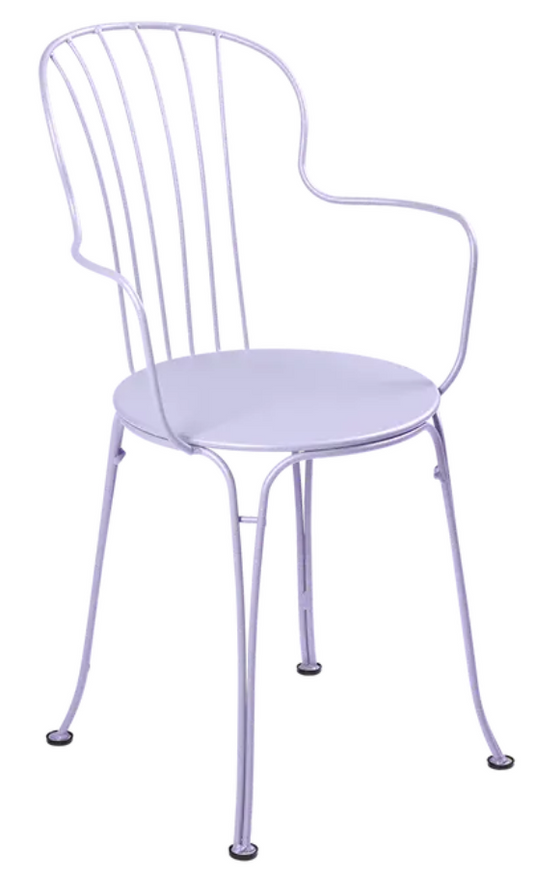 Fermob OPÉRA+ outdoor metal armchair with a sleek, curved design in a soft marshmallow color, perfect for patio seating.
