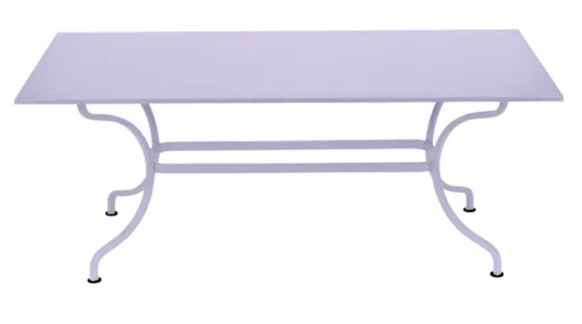 Fermob Romane table measuring 180x100 cm with space for up to 8 guests, featuring a sleek, modern outdoor table design.