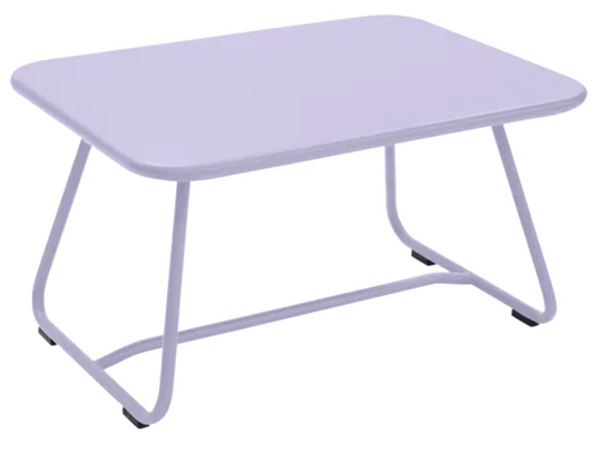 Fermob Sixties Low Outdoor Table in a marshmallow color, measuring 76 x 55.5cm, suitable for outdoor patio or garden use.