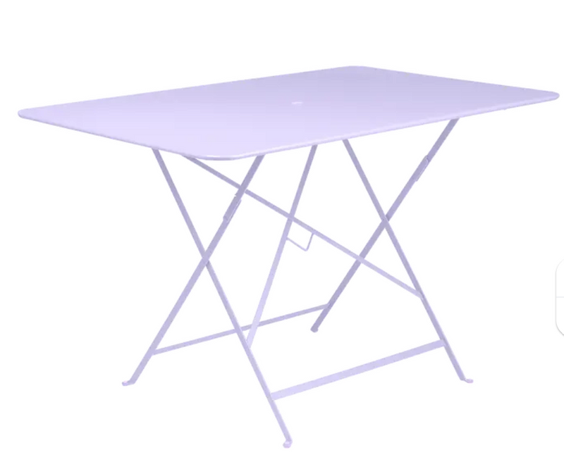 Load image into Gallery viewer, Marshmallow blue Fermob foldable bistro table, 117 x 77 cm, outdoor metal furniture, shown in a stylish outdoor setting
