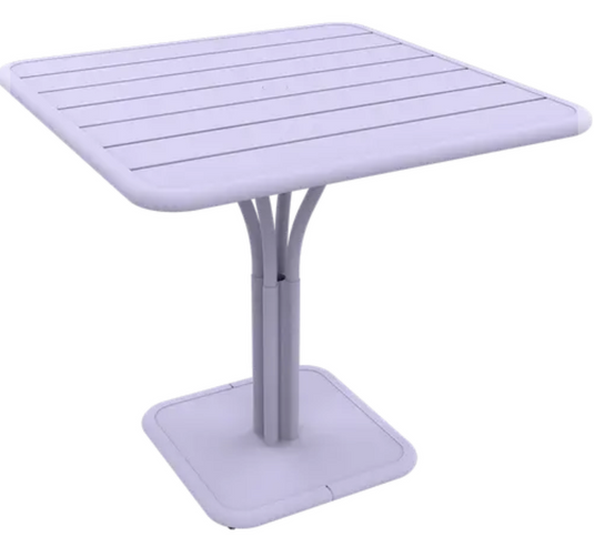 Marshmallow white Fermob Luxembourg outdoor pedestal table, 80x80 cm, with a sleek round design for garden or patio use.