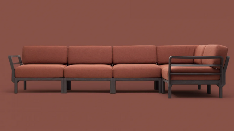 Load image into Gallery viewer, Maximo 5 modular outdoor sofa from Custom Wood Designs, showing a stylish seating system with cushions on a hotel terrace.
