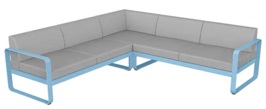 Fermob Bellevie outdoor sofa set with blue and grey cushions, modular design, suited for garden or patio relaxation.