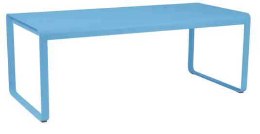 Fermob Bellevie outdoor metal dining table in Maya Blue, 196 x 90 cm, designed for eight-seater outdoor dining.