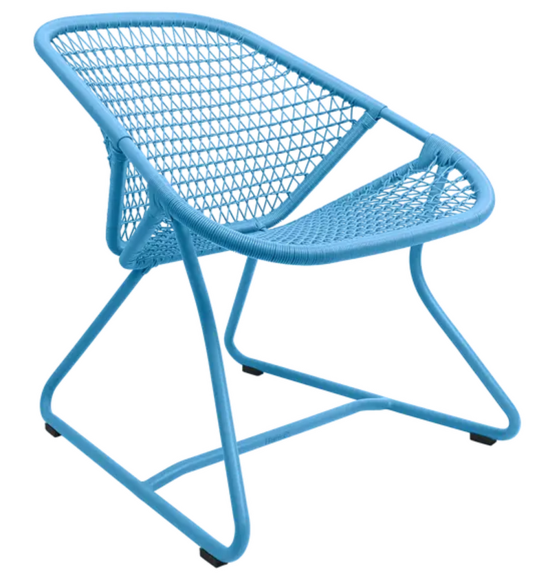 Load image into Gallery viewer, Maya blue Fermob Sixties low armchair, woven lounge chair with stylish design for restaurant or lounge settings.
