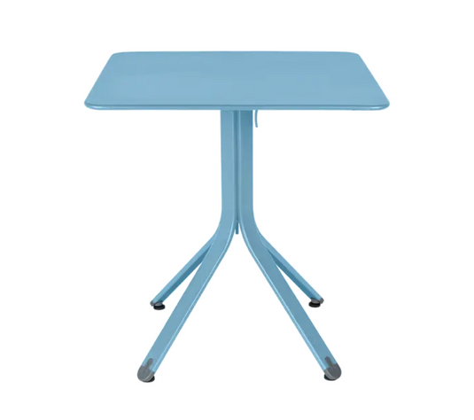 Fermob Rest'O folding outdoor table in Maya Blue with 71x71cm metal top, ideal for compact patio or balcony setup.