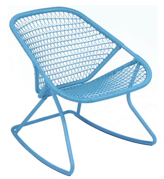 Maya blue Fermob outdoor metal Sixties rocking chair with curved armrests and slatted seat, ideal for garden or patio relaxing.