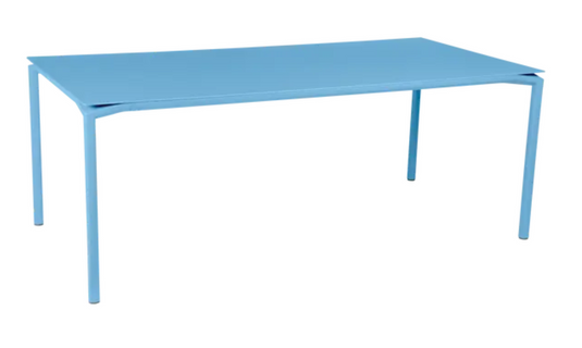 Fermob Calvi outdoor rectangular dining table in Maya Blue, 195x95 cm, eight-seater, suitable for outdoor and indoor use