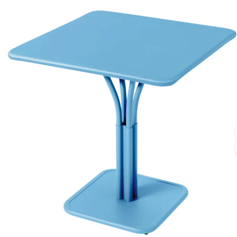 Load image into Gallery viewer, Fermob Luxembourg metal outdoor table with Maya Blue finish, 71x71 inches, solid aluminum top, ideal for patio or restaurant use.
