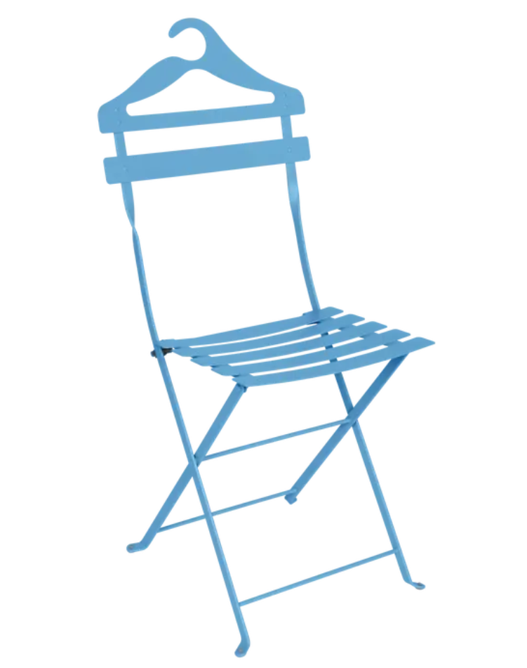 Load image into Gallery viewer, Maya Blue Fermob Bistro Valet Folding Chair hanging on a metal frame, showcasing its foldable design and stylish metal construction.
