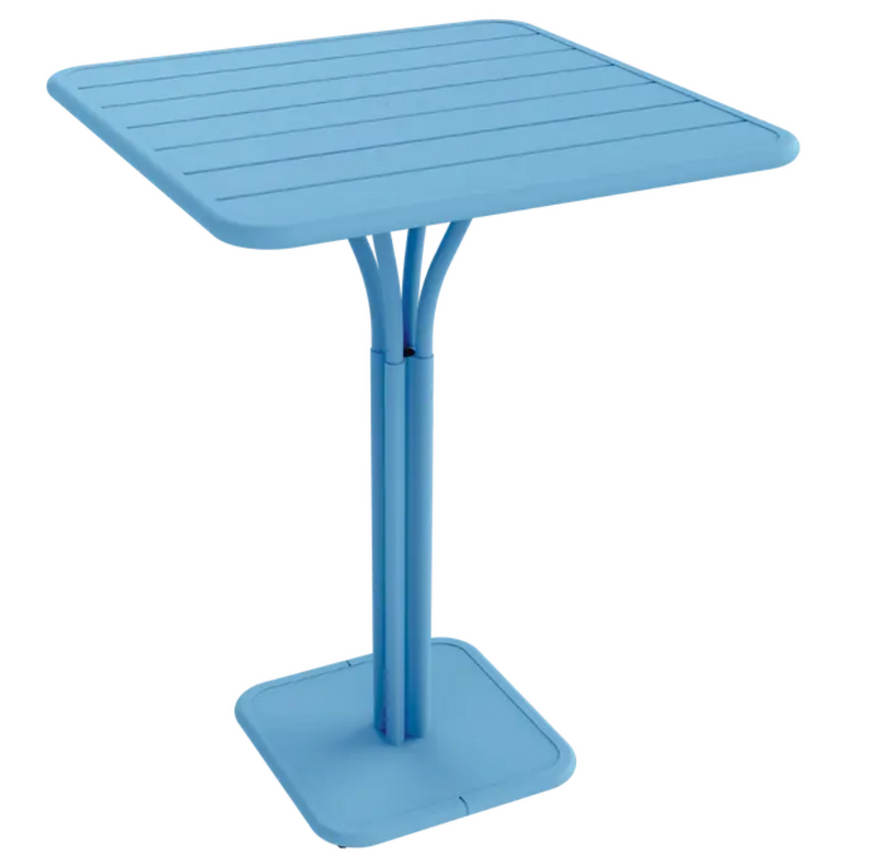 Load image into Gallery viewer, Maya blue Fermob Luxembourg high pedestal metal outdoor table, 80x80 cm, with a sleek modern design and sturdy metal construction.
