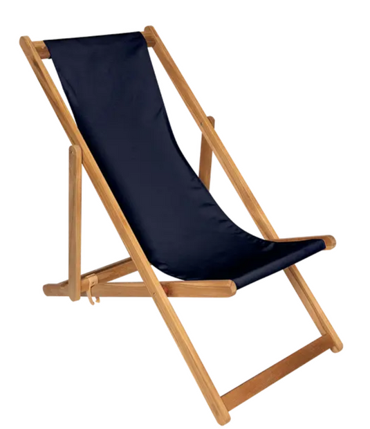 Midnight blue Fermob Ibiza teak deck chair with a sleek design, ideal for outdoor relaxation on a stylish patio.