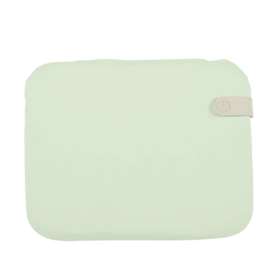 Mint green Fermob outdoor cushion measuring 38x30cm, designed for outdoor chairs with burgundy fabric seat pad.