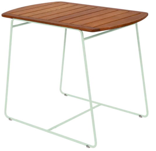 Fermob outdoor teak table, 90 x 60cm, with a smooth surface and sturdy legs, designed for outdoor use.