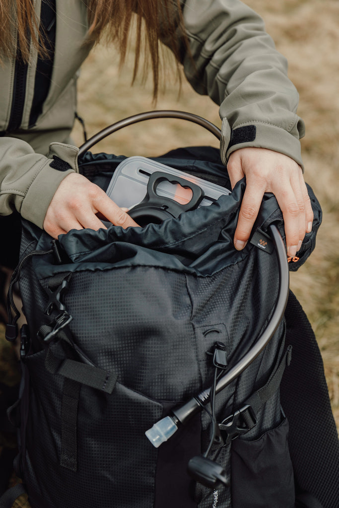 Load image into Gallery viewer, Nordic Drift Trail RCS backpack 33L in black with adjustable straps and multiple compartments, designed for travel and outdoor use.
