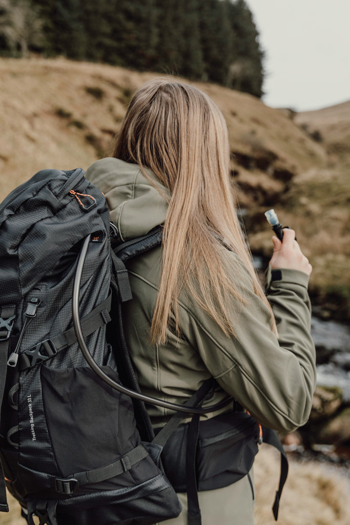 Load image into Gallery viewer, Nordic Drift Drift Trail RCS 33L backpack with multiple compartments, black color, and padded shoulder straps for travel and daily use.
