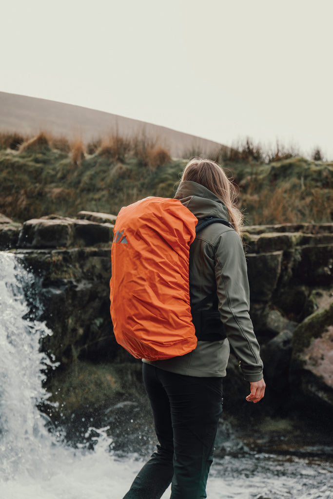 Load image into Gallery viewer, Nordic Drift Trail RCS backpack 33L in black, featuring multiple compartments and padded straps for travel and outdoor use.
