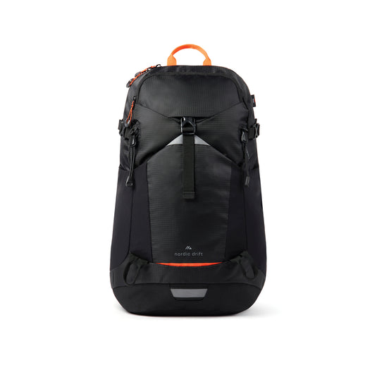 Nordic Drift Drift Trail RCS 24L backpack showing black fabric, multiple compartments, and adjustable straps for travel and daily use.