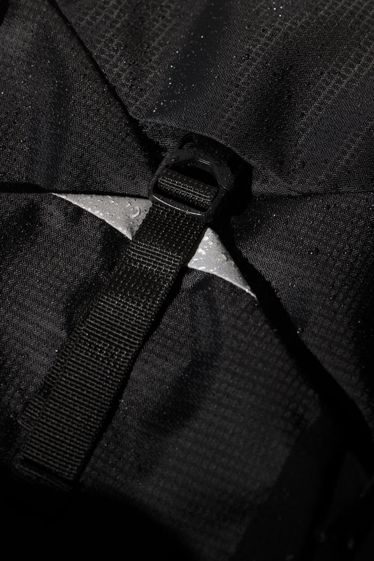 Nordic Drift Trail RCS backpack 24L in black with multiple compartments, designed for outdoor and travel use.