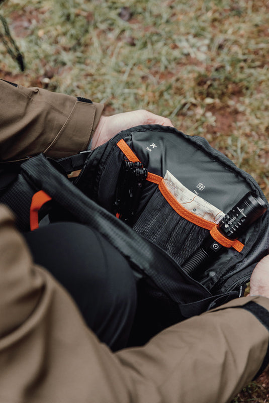 Nordic Drift Drift Trail RCS 24L backpack with multiple compartments and adjustable straps, suitable for travel and daily use.