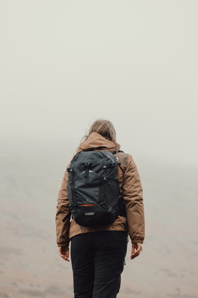 Load image into Gallery viewer, Nordic Drift Drift Trail RCS 24L backpack showing black and gray design with adjustable straps and multiple compartments.
