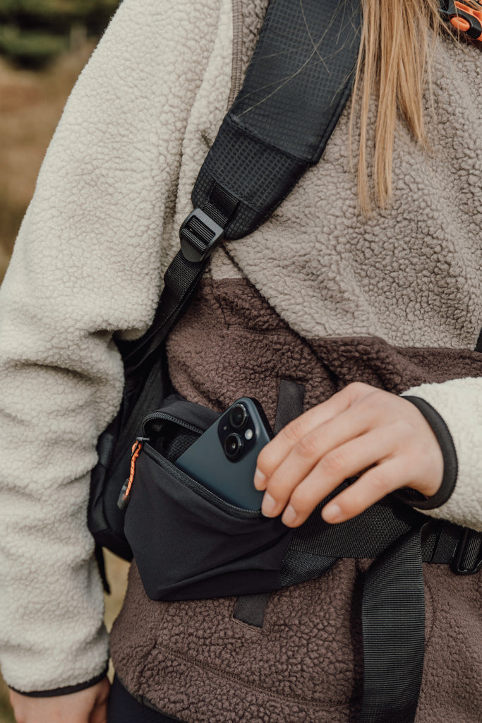 Load image into Gallery viewer, Nordic Drift Trail RCS 24L backpack showing black nylon material, multiple compartments, and adjustable straps for outdoor travel.
