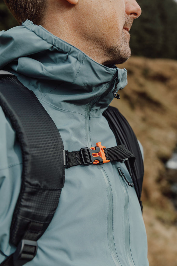 Load image into Gallery viewer, Nordic Drift Trail RCS 24L backpack showing front view with adjustable straps and multiple compartments in durable black fabric.
