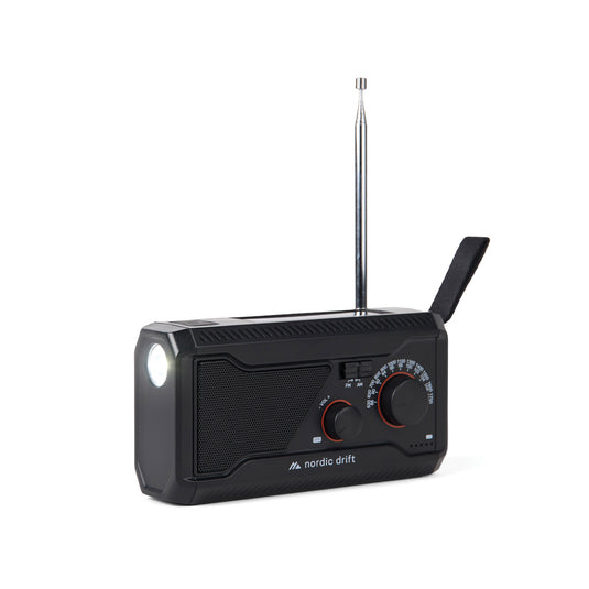 Nordic Drift Titan IPX4 multifunctional radio with 4000mAh battery, featuring digital display and portable audio design.