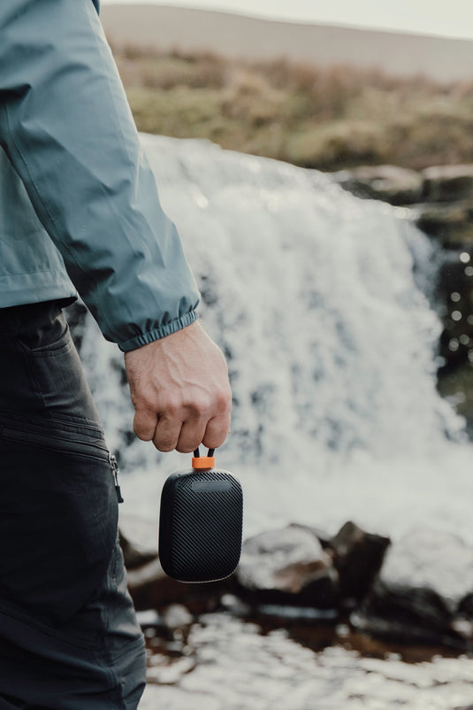 Nordic Drift Titan 5W IP67 waterproof and dustproof audio speaker with rugged design and control buttons on the front.