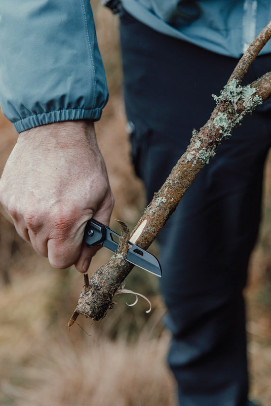 Nordic Drift Adventure folding knife with black handle and stainless steel blade, ideal for outdoor tools and camping tasks.
