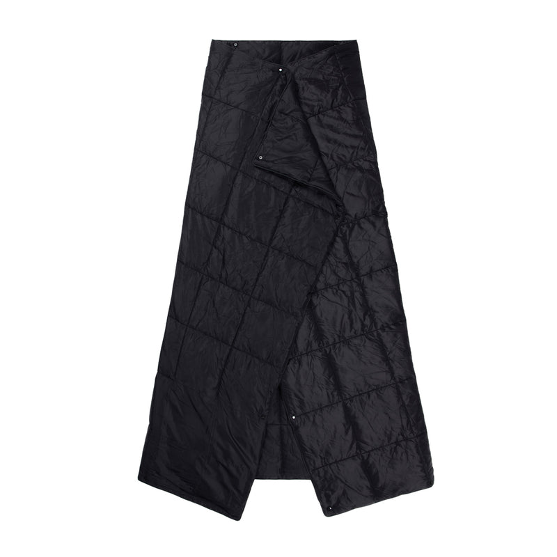 Load image into Gallery viewer, Nordic Drift GRS 3-in-1 Adventure Blanket for outdoor use, showing its versatile design and cozy material in a natural outdoor setting.
