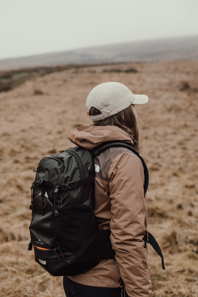 Load image into Gallery viewer, Nordic Drift RCS Aero UPF 50+ cap in navy with curved brim and adjustable strap, designed for sun protection and sporty style.

