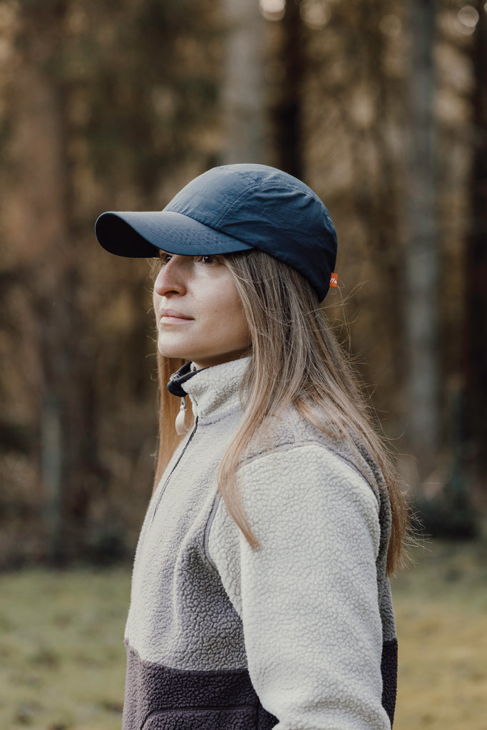 Load image into Gallery viewer, Nordic Drift RCS Aero UPF 50+ cap, sporty headwear with adjustable strap, in black with Nordic Drift branding.
