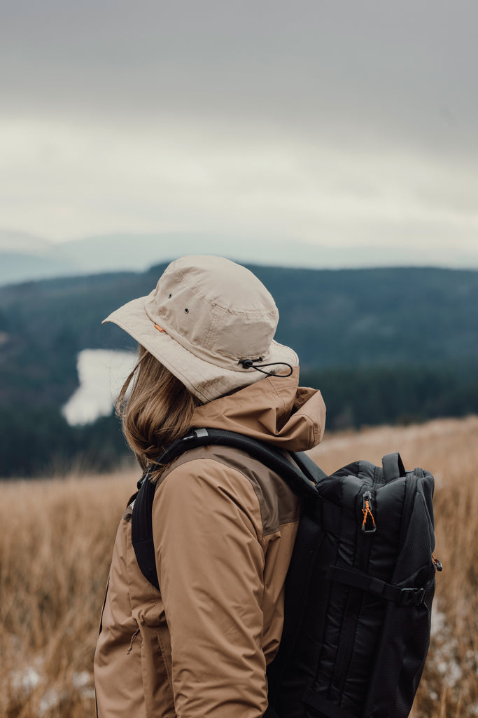 Load image into Gallery viewer, Nordic Drift RCS Horizon UPF 50+ bucket hat in neutral color, lightweight headwear with wide brim for sun protection.
