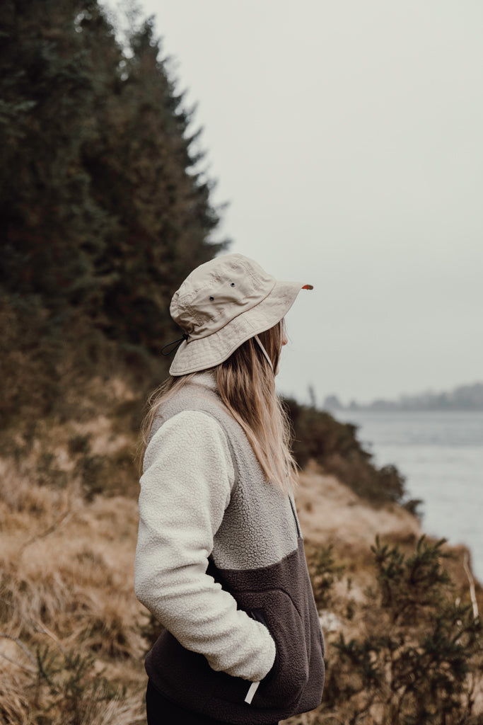 Load image into Gallery viewer, Nordic Drift RCS Horizon UPF 50+ bucket hat in neutral color, sun protection headwear with wide brim and adjustable strap.
