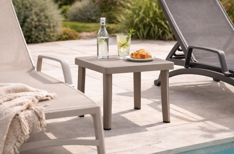 Load image into Gallery viewer, Nardi Rodi low outdoor table with rounded edges and smooth surface, ideal for patio or garden seating areas.
