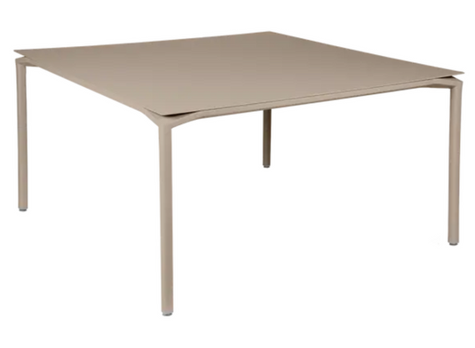 Fermob CALVI square dining table in nutmeg color, 140x140 cm, suitable for eight seats, metal construction, modern design.
