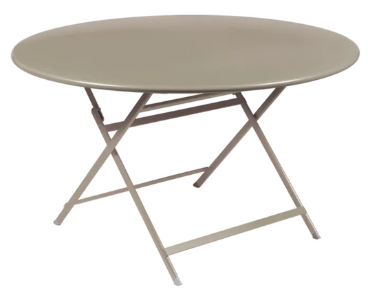 Fermob Caractère foldable metal table with 128 cm diameter, nutmeg color, set for eight seats, and compact in a folded position.