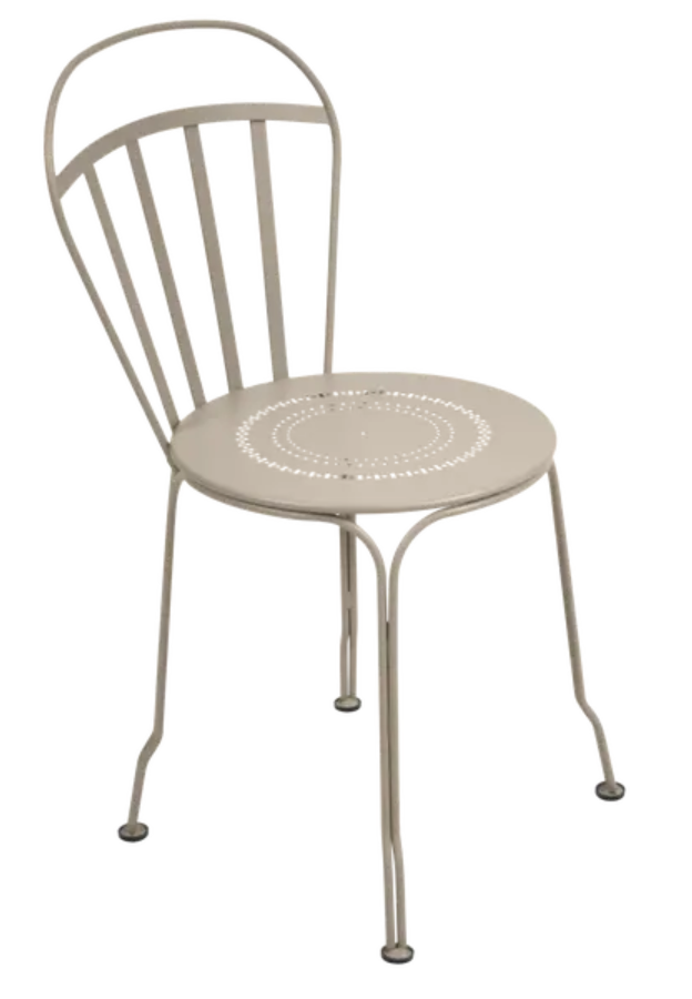 Load image into Gallery viewer, Nutmeg Fermob Louvre outdoor chair with curved metal frame and slatted seat, perfect for garden or patio seating.
