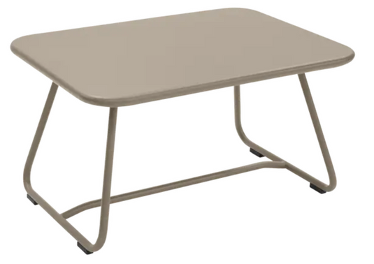 Nutmeg Fermob Sixties low outdoor table with 76x55.5cm dimensions, stylish and durable for garden or patio use.
