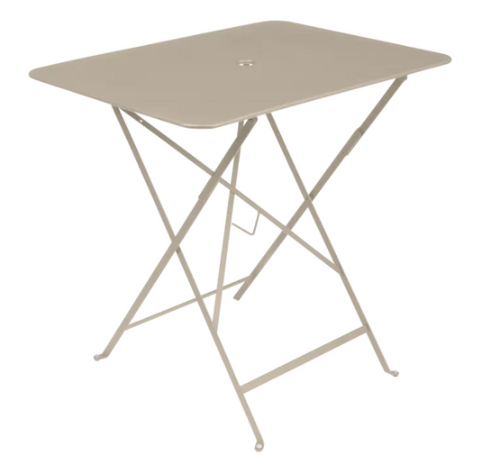 Nutmeg Fermob foldable bistro table measuring 77x57 cm, made of metal, suitable for outdoor use with a compact, foldable design.
