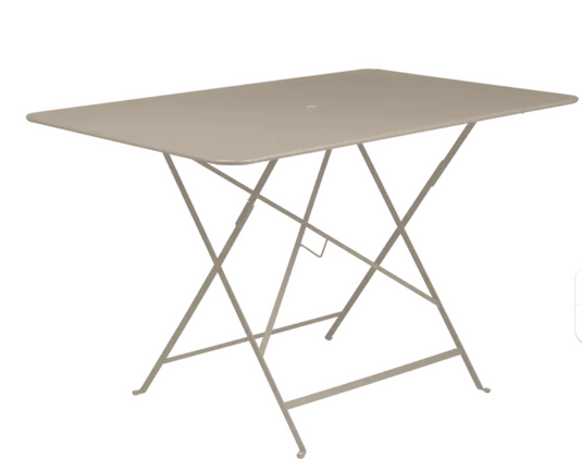 Fermob foldable bistro table in nutmeg color, 117 x 77 cm, outdoor metal furniture, shown with a smooth surface and foldable design.