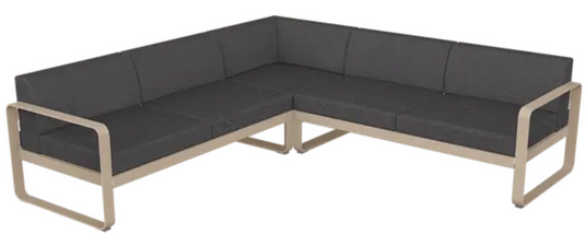 Fermob Bellevie Composition 2 outdoor lounge sofa set with nutmeg and graphite grey cushions on a modern patio.