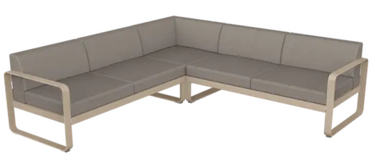 Fermob Bellevie Composition 2 outdoor lounge sofa set with nutmeg, grey, and taupe cushions on a stylish patio setting.