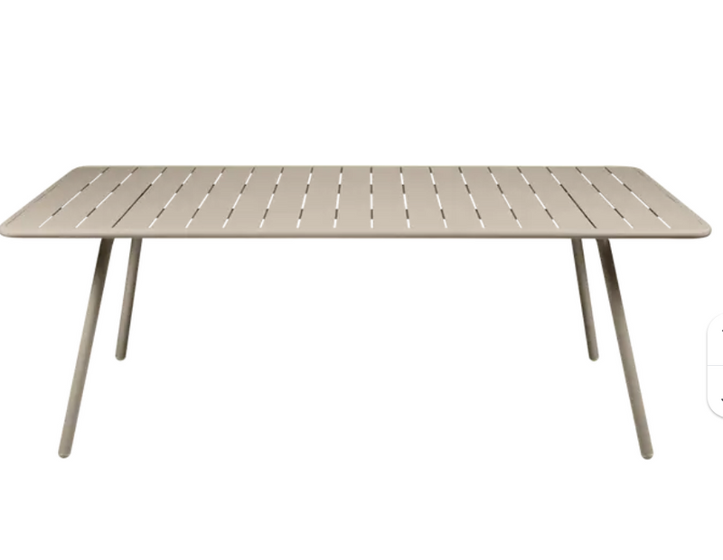 Load image into Gallery viewer, Outdoor Fermob Luxembourg table in nutmeg color, 207x100 cm, with a sleek design perfect for outdoor dining and gatherings.
